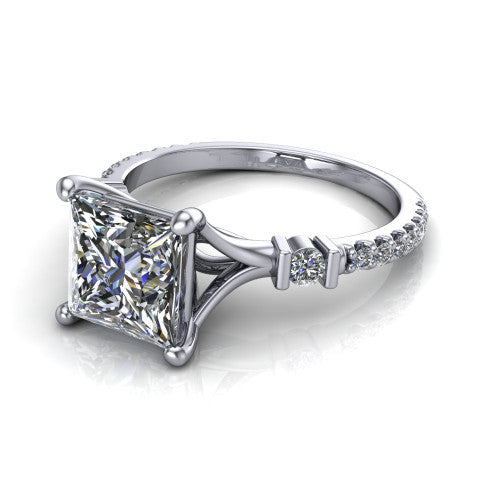 Arabella princess solitaire engagement ring in 18K White Gold, three-quarter perspective showing the princess center diamond above a pave band with bezel-set shoulder accents