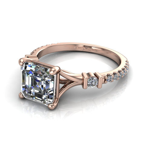 Arabella square emerald solitaire engagement ring in 14K Rose Gold, three-quarter perspective showing the square emerald center diamond above a pave band with bezel-set shoulder accents