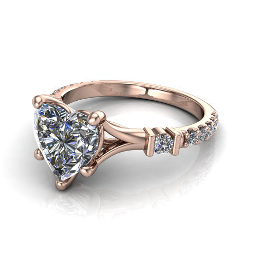 Arabella heart solitaire engagement ring in 14K Rose Gold, three-quarter perspective showing the heart center diamond above a pave band with bezel-set shoulder accents