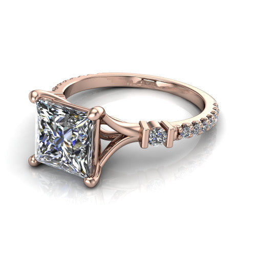 Arabella princess solitaire engagement ring in 14K Rose Gold, three-quarter perspective showing the princess center diamond above a pave band with bezel-set shoulder accents