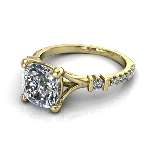 Arabella cushion solitaire engagement ring in 14K Yellow Gold, three-quarter perspective showing the cushion center diamond above a pave band with bezel-set shoulder accents