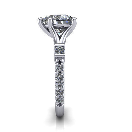 Arabella heart solitaire engagement ring in 18K White Gold, side profile showing the bezel-set square accents and pave band