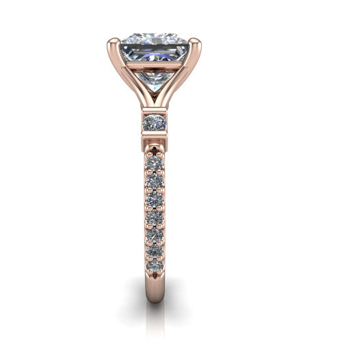 Arabella princess solitaire engagement ring in 14K Rose Gold, side profile showing the bezel-set square accents and pave band