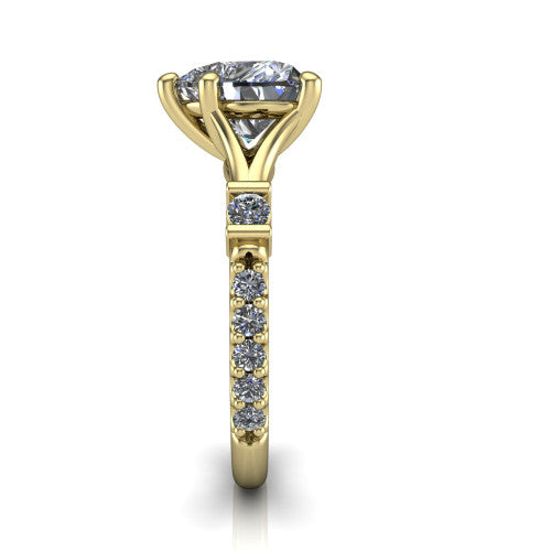 Arabella heart solitaire engagement ring in 14K Yellow Gold, side profile showing the bezel-set square accents and pave band