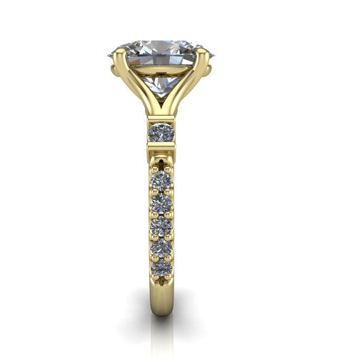Arabella oval solitaire engagement ring in 18K Yellow Gold, side profile showing the bezel-set square accents and pave band
