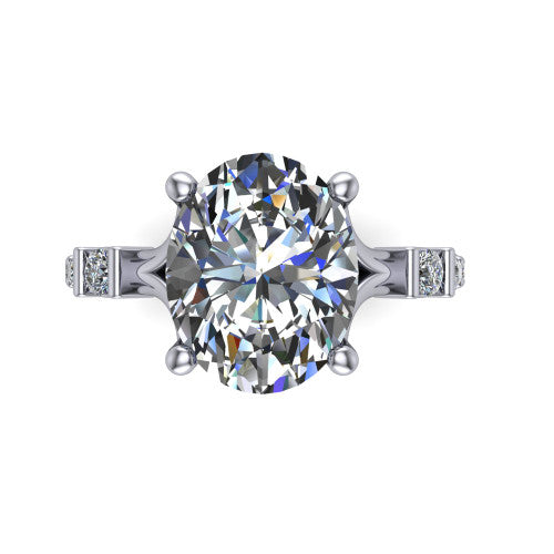 Arabella oval solitaire engagement ring in Platinum, top-down view showing the four-prong oval center diamond and shoulder accents