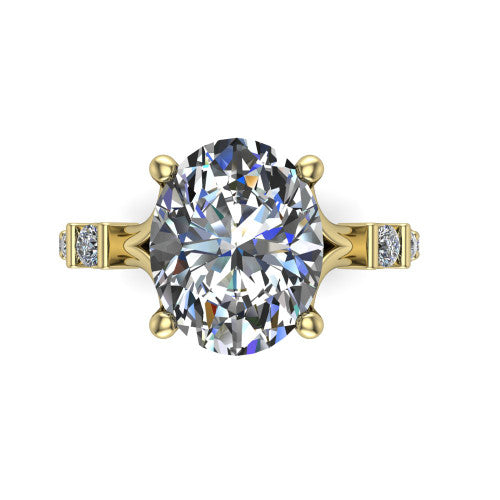 Arabella oval solitaire engagement ring in 18K Yellow Gold, top-down view showing the four-prong oval center diamond and shoulder accents