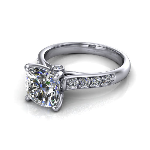 Nena cushion solitaire engagement ring in 18K White Gold, three-quarter perspective showing the cushion center diamond above channel-set shoulders