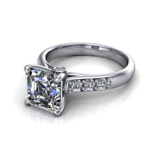 Nena square emerald solitaire engagement ring in Platinum, three-quarter perspective showing the square emerald center diamond above channel-set shoulders