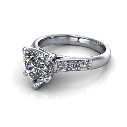 Nena heart solitaire engagement ring in 14K White Gold, three-quarter perspective showing the heart center diamond above channel-set shoulders