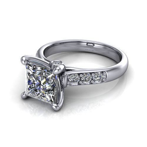 Nena princess solitaire engagement ring in Platinum, three-quarter perspective showing the princess center diamond above channel-set shoulders