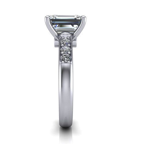Nena emerald solitaire engagement ring in 14K White Gold, side profile showing the channel-set shoulder diamonds