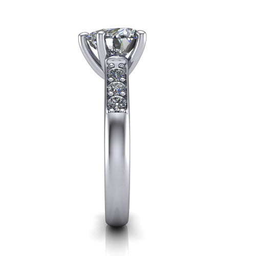 Nena heart solitaire engagement ring in 14K White Gold, side profile showing the channel-set shoulder diamonds