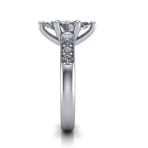 Nena marquise solitaire engagement ring in 18K White Gold, side profile showing the channel-set shoulder diamonds