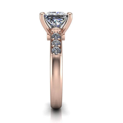 Nena princess solitaire engagement ring in 18K Rose Gold, side profile showing the channel-set shoulder diamonds