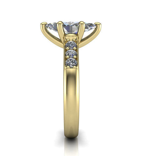 Nena marquise solitaire engagement ring in 18K Yellow Gold, side profile showing the channel-set shoulder diamonds