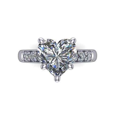 Nena heart solitaire engagement ring in Platinum, top-down view showing the four-prong heart center diamond and channel-set shoulders