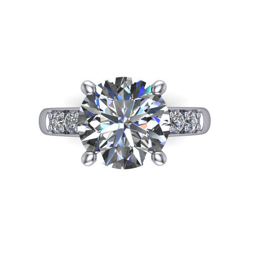Nena round solitaire engagement ring in 14K White Gold, top-down view showing the four-prong round center diamond and channel-set shoulders
