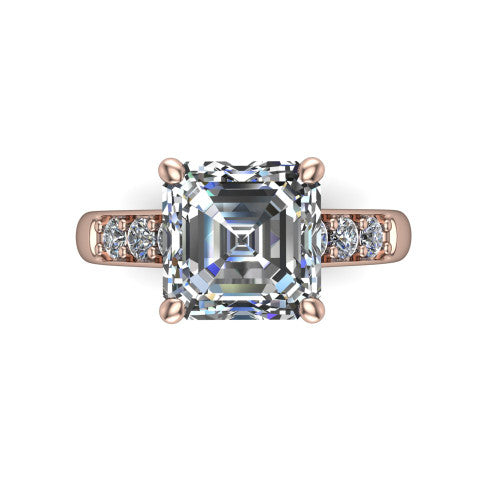 Nena square emerald solitaire engagement ring in 14K Rose Gold, top-down view showing the four-prong square emerald center diamond and channel-set shoulders