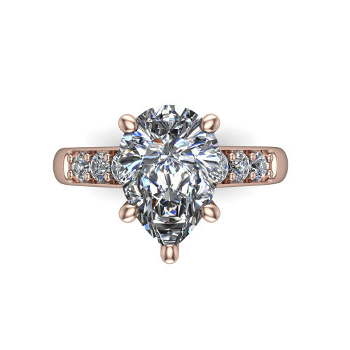 Nena pear solitaire engagement ring in 14K Rose Gold, top-down view showing the four-prong pear center diamond and channel-set shoulders
