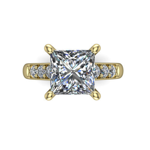 Nena princess solitaire engagement ring in 14K Yellow Gold, top-down view showing the four-prong princess center diamond and channel-set shoulders
