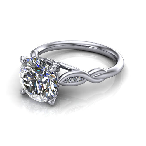 Lennon round solitaire engagement ring in 18K White Gold, three-quarter perspective showing the round center diamond above a twisted willow band