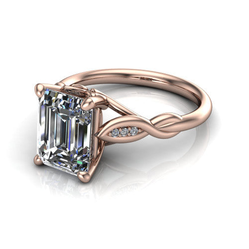 Lennon emerald solitaire engagement ring in 14K Rose Gold, three-quarter perspective showing the emerald center diamond above a twisted willow band