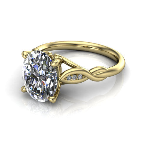 Lennon oval solitaire engagement ring in 18K Yellow Gold, three-quarter perspective showing the oval center diamond above a twisted willow band