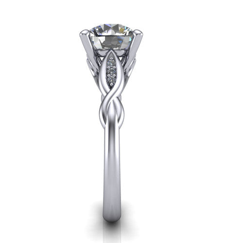 Lennon round solitaire engagement ring in 18K White Gold, side profile showing the twisted infinity band with accent diamonds