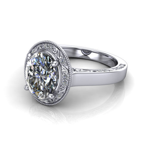 Elara oval vintage engagement ring in 14K White Gold, three-quarter perspective showing the oval center diamond, milgrain halo, and hand-engraved band