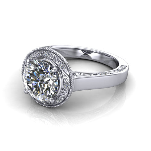 Elara round vintage engagement ring in 14K White Gold, three-quarter perspective showing the round center diamond, milgrain halo, and hand-engraved band