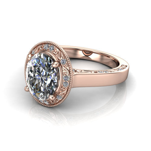 Elara oval vintage engagement ring in 18K Rose Gold, three-quarter perspective showing the oval center diamond, milgrain halo, and hand-engraved band