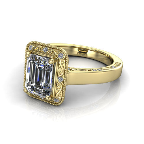 Elara emerald-cut vintage engagement ring in 18K Yellow Gold, three-quarter perspective showing the emerald-cut center diamond, milgrain halo, and hand-engraved band