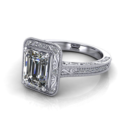 Juliana emerald-cut vintage halo engagement ring in Platinum, three-quarter perspective showing the emerald-cut center diamond, milgrain halo, and hand-engraved band