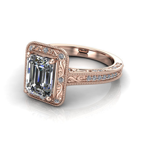 Juliana emerald-cut vintage halo engagement ring in 14K Rose Gold, three-quarter perspective showing the emerald-cut center diamond, milgrain halo, and hand-engraved band
