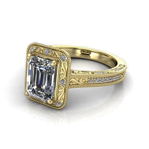 Juliana emerald-cut vintage halo engagement ring in 14K Yellow Gold, three-quarter perspective showing the emerald-cut center diamond, milgrain halo, and hand-engraved band