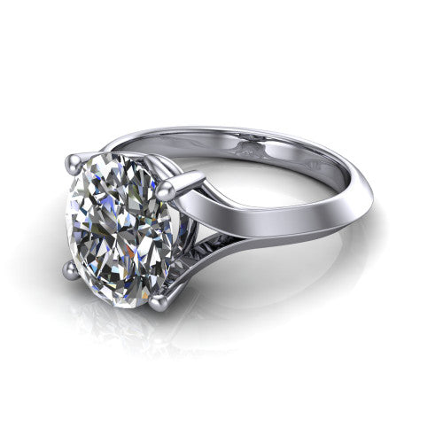 Joanna oval solitaire engagement ring in Platinum, three-quarter perspective showing the oval center diamond on a cathedral shank