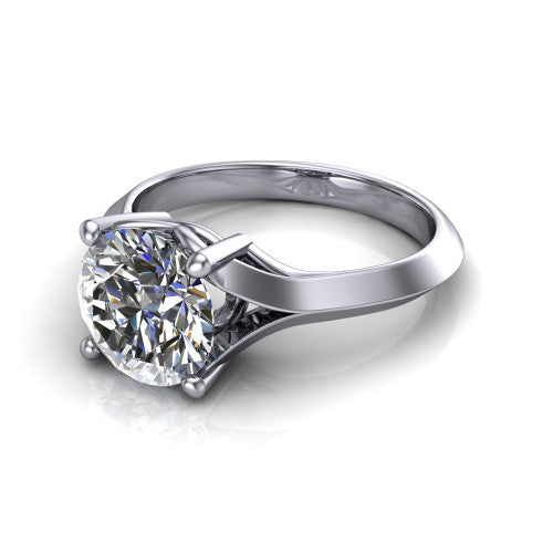 Joanna round solitaire engagement ring in Platinum, three-quarter perspective showing the round center diamond on a cathedral shank