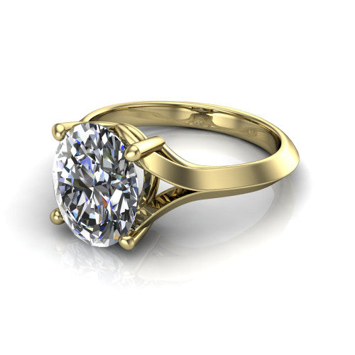 Joanna oval solitaire engagement ring in 18K Yellow Gold, three-quarter perspective showing the oval center diamond on a cathedral shank