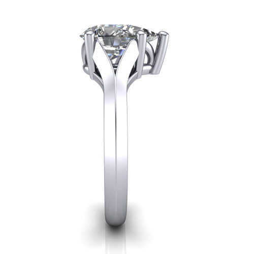 Joanna pear solitaire engagement ring in Platinum, side profile showing the cathedral shank and polished band