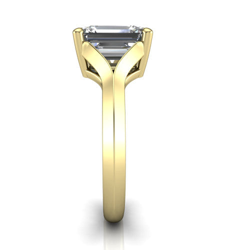 Joanna emerald solitaire engagement ring in 18K Yellow Gold, side profile showing the cathedral shank and polished band