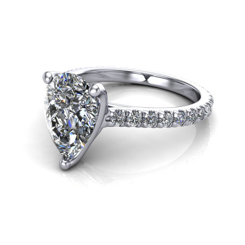 Honora pear-shaped solitaire engagement ring in Platinum, three-quarter perspective showing the pear-shaped center diamond, double-claw prongs, and pavé band