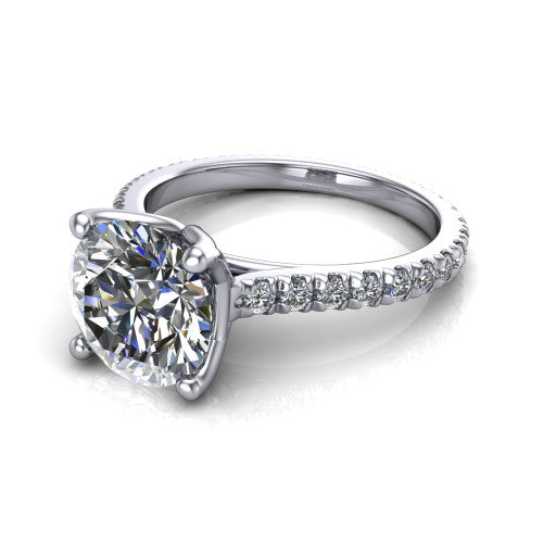 Honora round solitaire engagement ring in 18K White Gold, three-quarter perspective showing the round center diamond, double-claw prongs, and pavé band