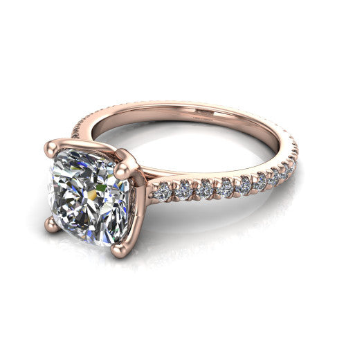 Honora cushion-cut solitaire engagement ring in 14K Rose Gold, three-quarter perspective showing the cushion-cut center diamond, double-claw prongs, and pavé band
