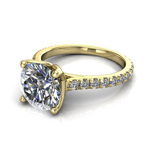 Honora round solitaire engagement ring in 14K Yellow Gold, three-quarter perspective showing the round center diamond, double-claw prongs, and pavé band