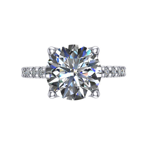 Honora round solitaire engagement ring in 18K White Gold, top-down view showing the round center diamond and pavé-set shoulders