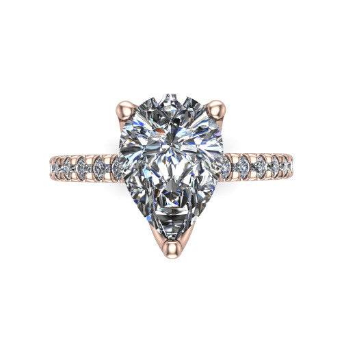 Honora pear-shaped solitaire engagement ring in 14K Rose Gold, top-down view showing the pear-shaped center diamond and pavé-set shoulders