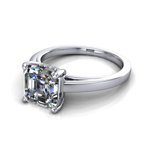 Itzel square emerald-cut classic engagement ring in Platinum, three-quarter perspective showing the square emerald-cut center diamond, double-claw prongs, and polished band