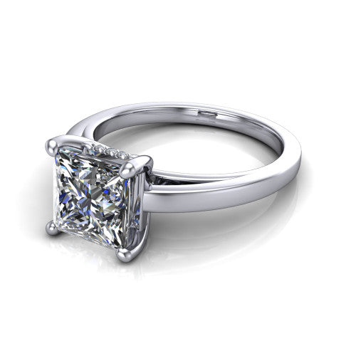 Itzel princess-cut classic engagement ring in 18K White Gold, three-quarter perspective showing the princess-cut center diamond, double-claw prongs, and polished band