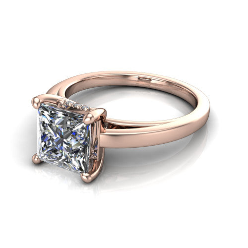 Itzel princess-cut classic engagement ring in 14K Rose Gold, three-quarter perspective showing the princess-cut center diamond, double-claw prongs, and polished band